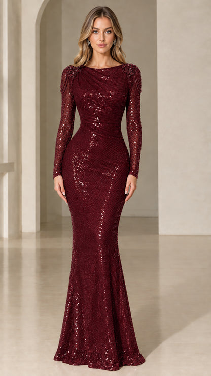Model wearing burgundy red sequin long sleeve mermaid formal dress