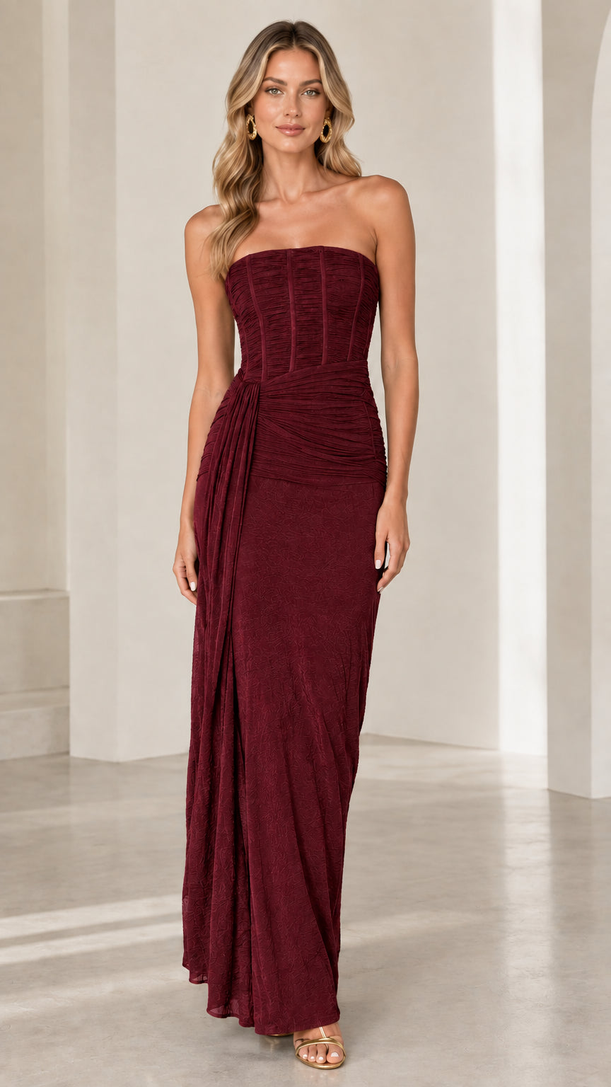 Full front view of burgundy wine red strapless corset evening gown
