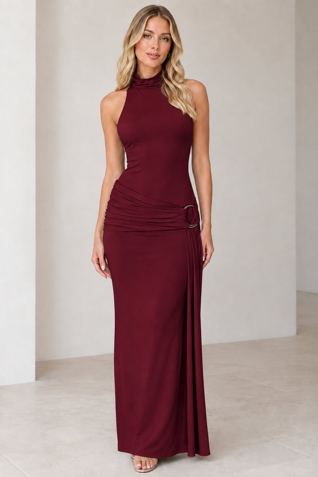 Model wearing burgundy wine high-neck sleeveless ruched maxi dress