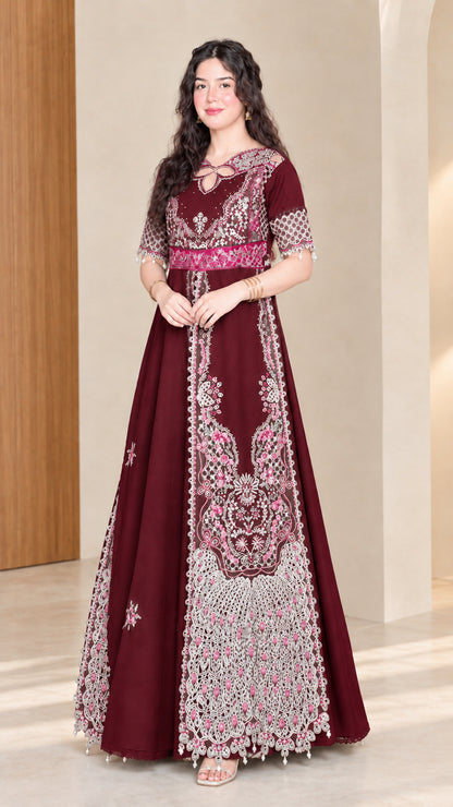 Front full view of woman wearing burgundy wine embroidered maxi dress