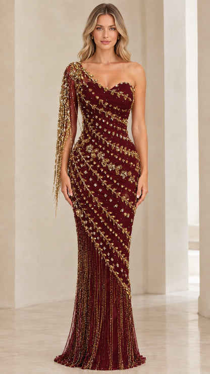 Front view of model wearing Burgundy wine one-shoulder beaded fringe evening gown