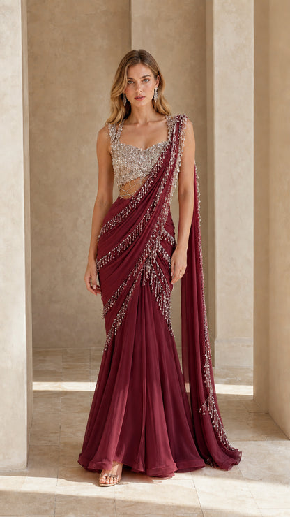 Front full view of burgundy wine embellished pre-draped saree evening gown