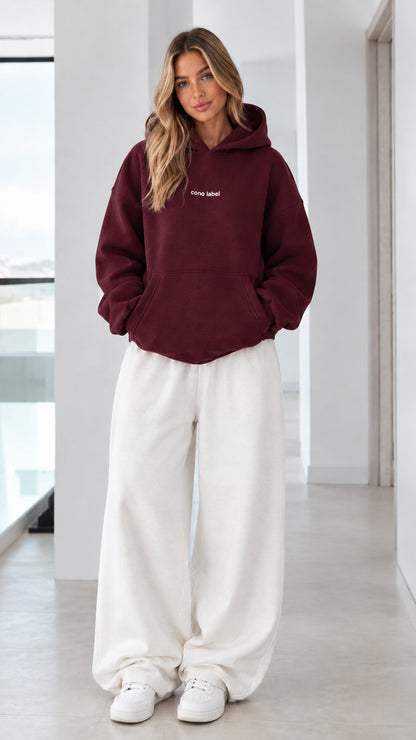 Women's burgundy wine red pullover hoodie on model