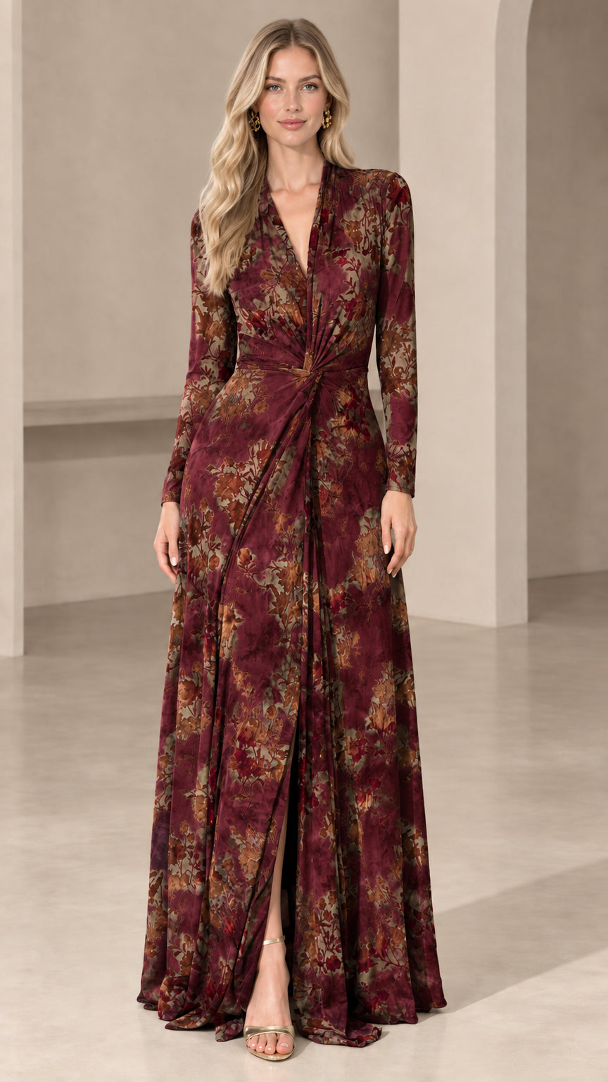 Front view of woman wearing burgundy floral long sleeve twist-front maxi dress