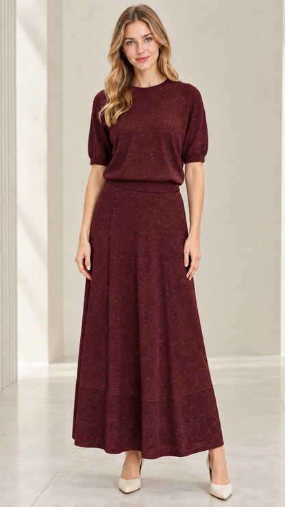 Model wearing burgundy wine red two-piece shimmer knit skirt set