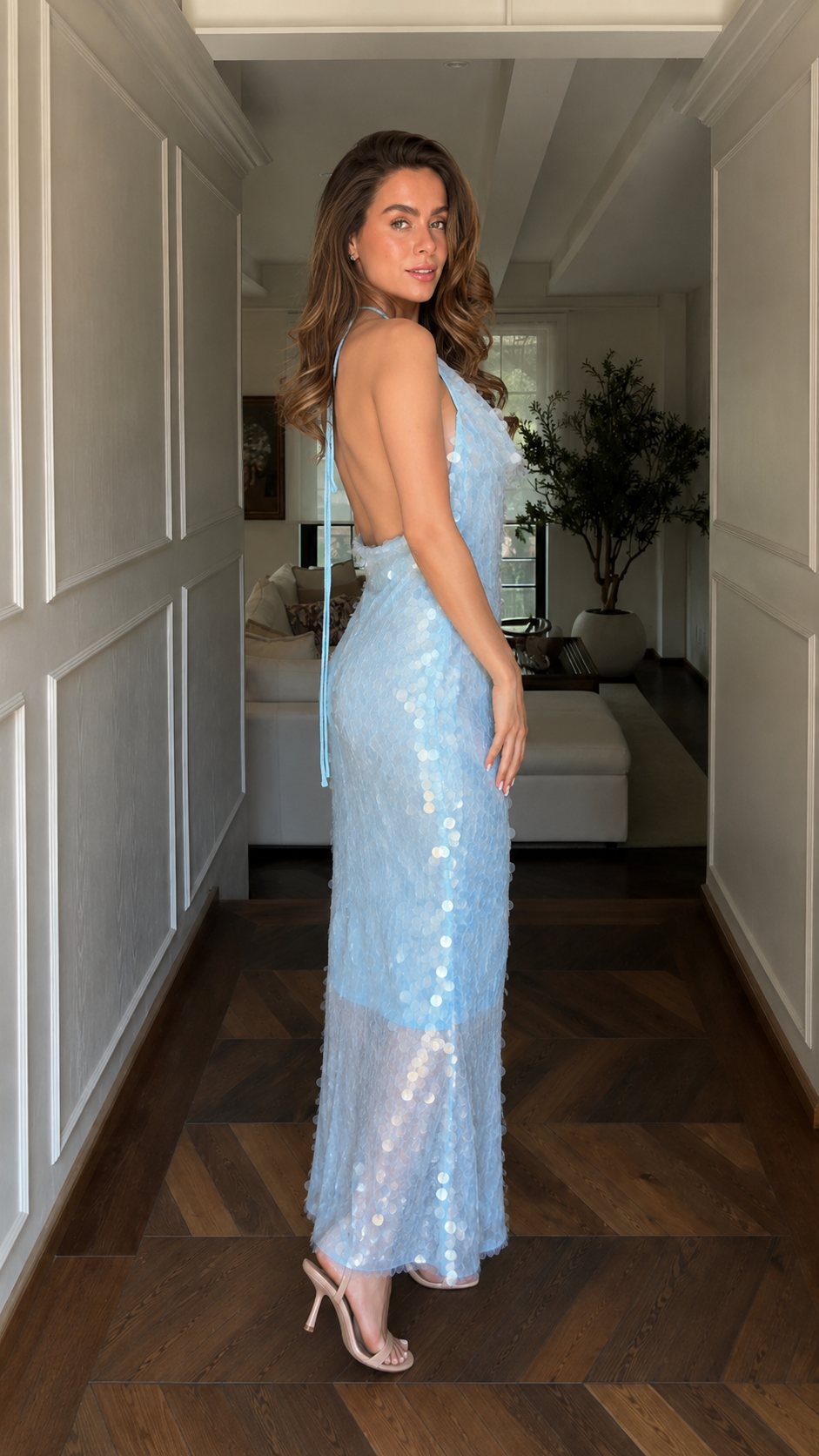 Side view of powder blue sequin halter maxi dress
