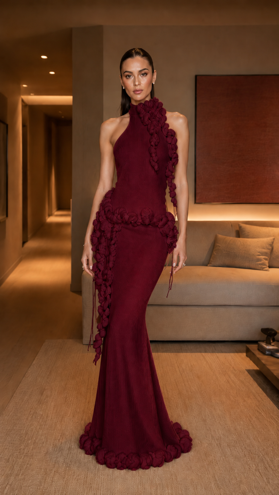 Front view of burgundy one-shoulder maxi gown with dramatic tonal ruffle detailing