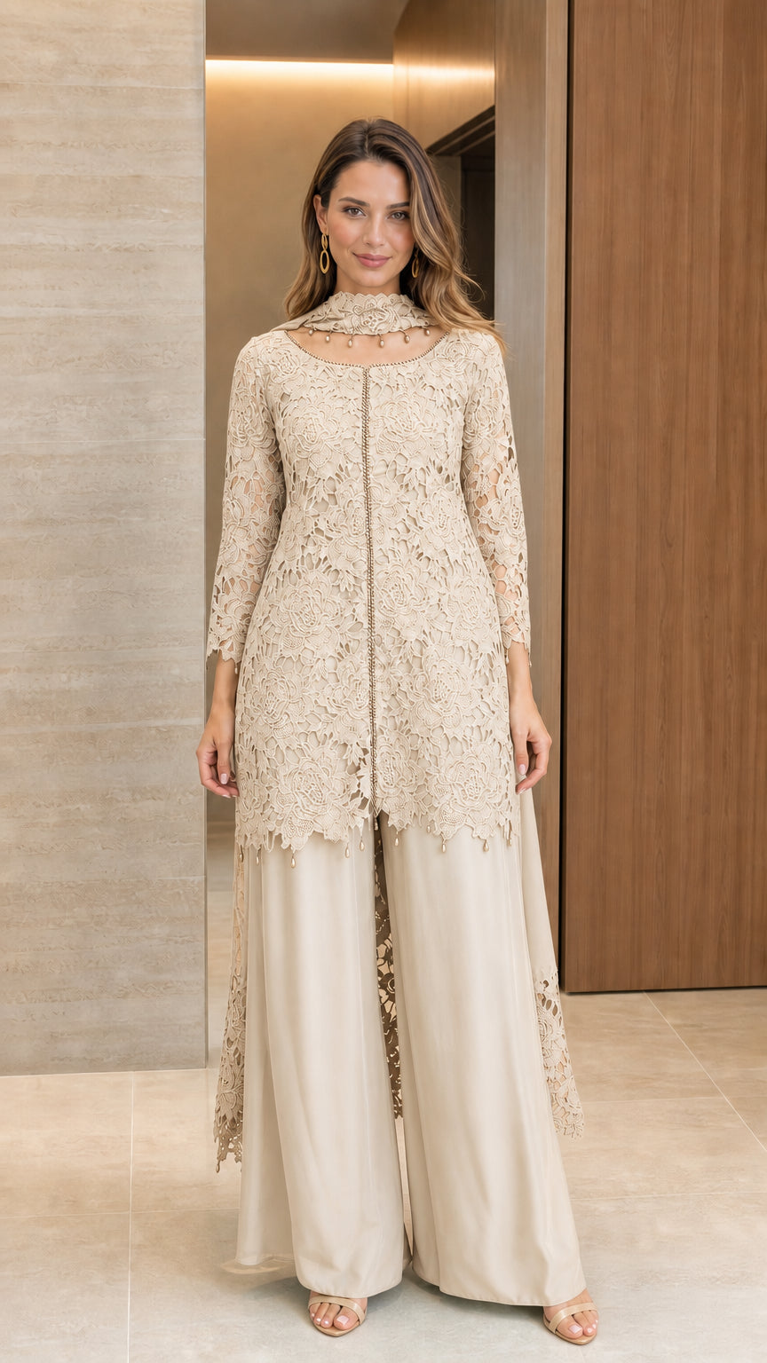 Front view of champagne beige floral lace tunic and wide-leg pant two-piece set