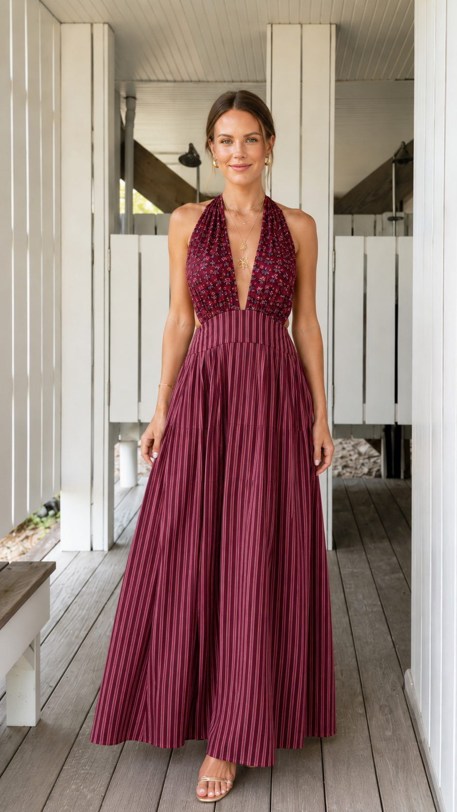 Front view of burgundy pleated halter backless maxi dress
