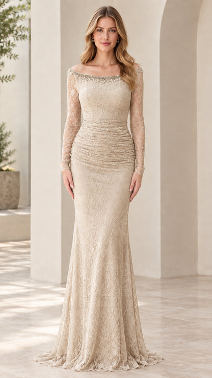 Front view of woman wearing champagne gold long sleeve ruched lace formal gown