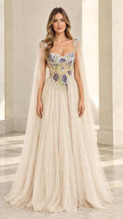 Champagne cream embroidered tulle evening gown with flowing cape details
