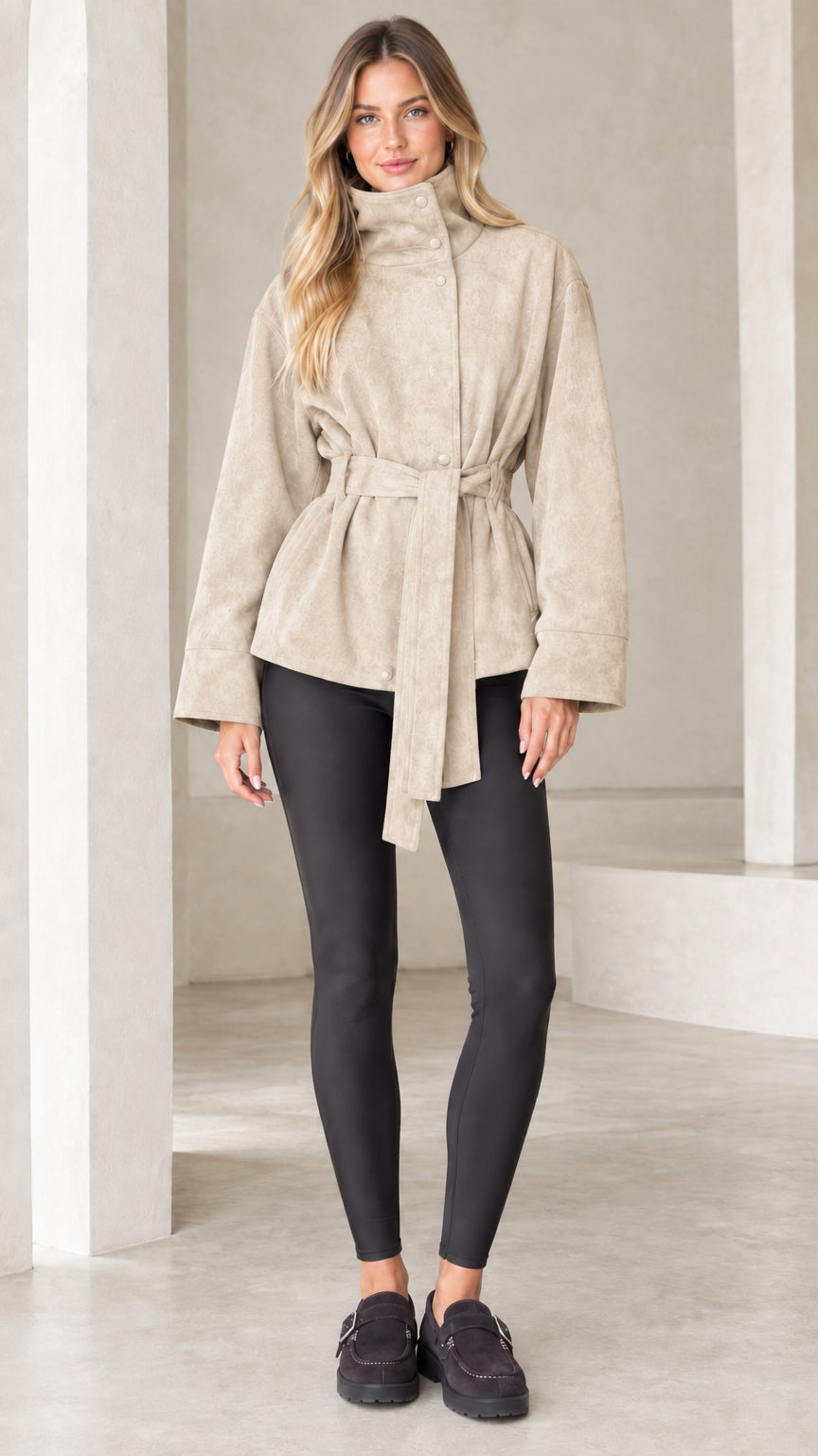 Model wearing beige high-neck belted faux suede jacket