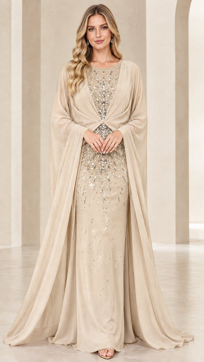 Model wearing champagne gold sequin cape evening gown