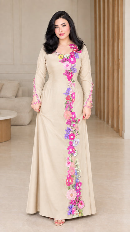 Front view of beige champagne floral embroidered formal maxi dress