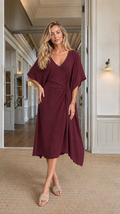 Front view of burgundy V-neck kimono sleeve asymmetric midi dress