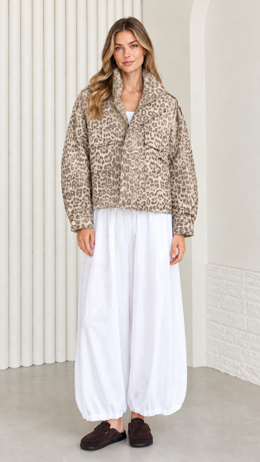 Model wearing classic beige tan leopard print cropped utility jacket