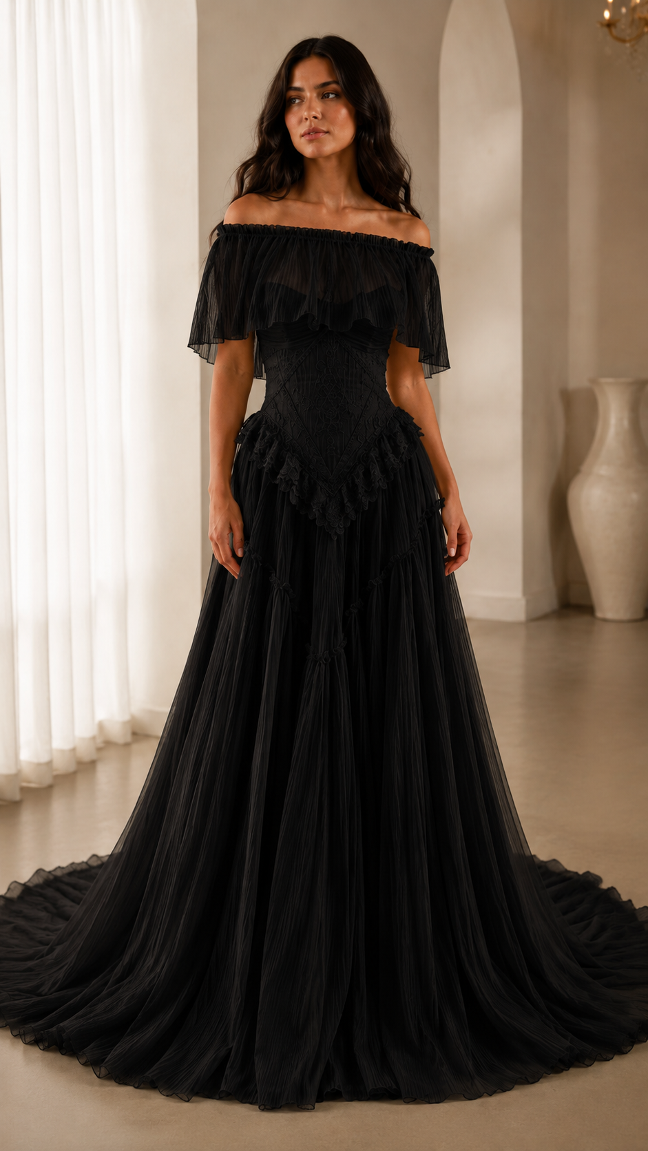 Black off-shoulder ruffle formal gown with dramatic flowing skirt front view