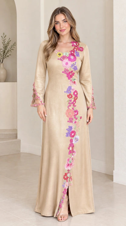 Champagne beige long sleeve maxi gown with cascading flowers